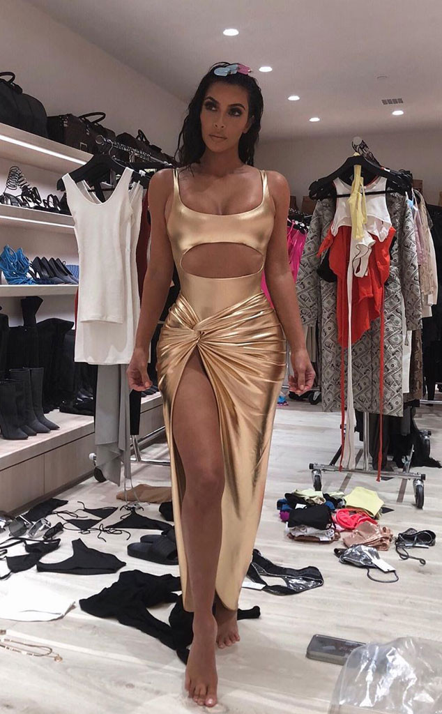 Kim Kardashian wardrobe malfunction neon dress Miami