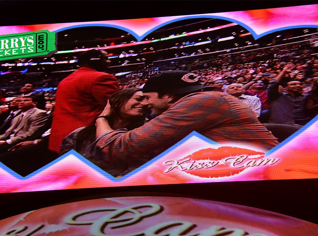 Mila Kunis & Ashton Kutcher from Celebs Caught on the Kiss Cam - E! News