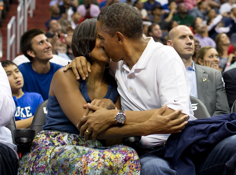 Kiss Cam Couples, Barack Obama kisses First Lady Michelle Obama 