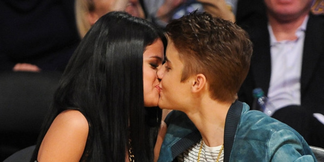 Photos from Celebs Caught on the Kiss Cam - E! Online
