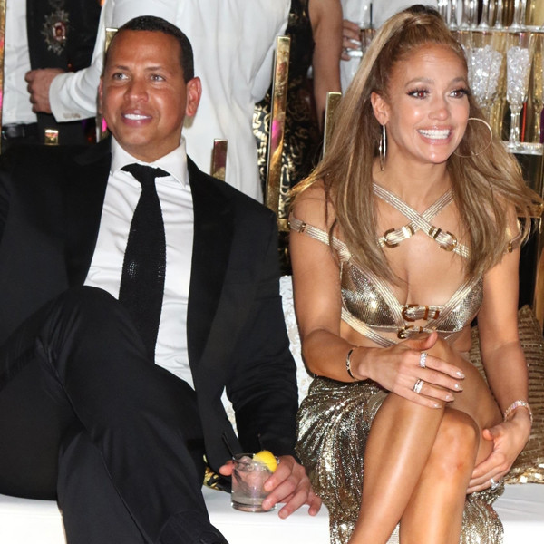 Alex Rodriguez Kisses Jennifer Lopez At Her 50th Birthday Party