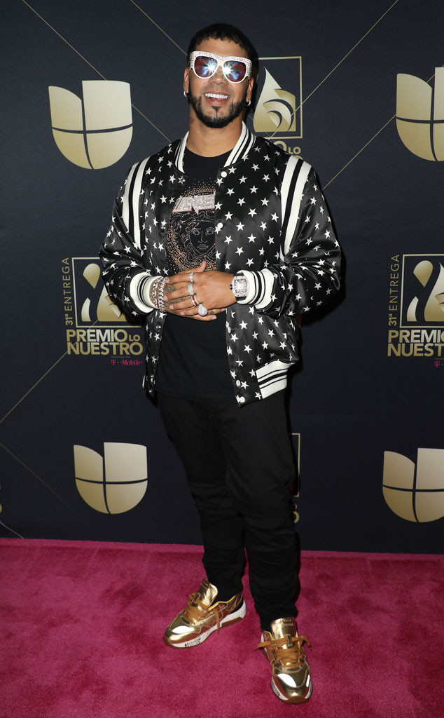 Anuel AA: Black Trucker Hat And Black Varsity Jacket - Iconic Celebrity  Outfits