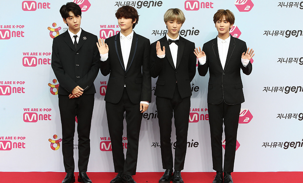 K Pop Group Txt Update Fans On Postponed Comeback Health Issues E Online Ap