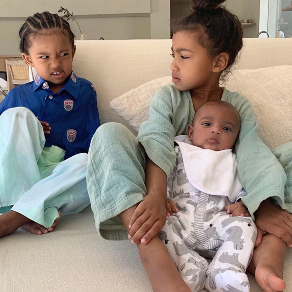 Kim Kardashian snuggles with baby Chicago, Saint and North in cute pic