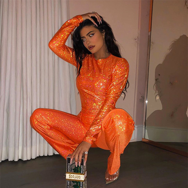 Kylie Jenner Stuns in an Orange Mini Dress: See Photos!