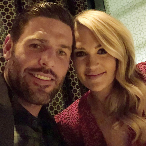 Carrie Underwood's husband, Mike Fisher, says he supports Aaron Rodgers