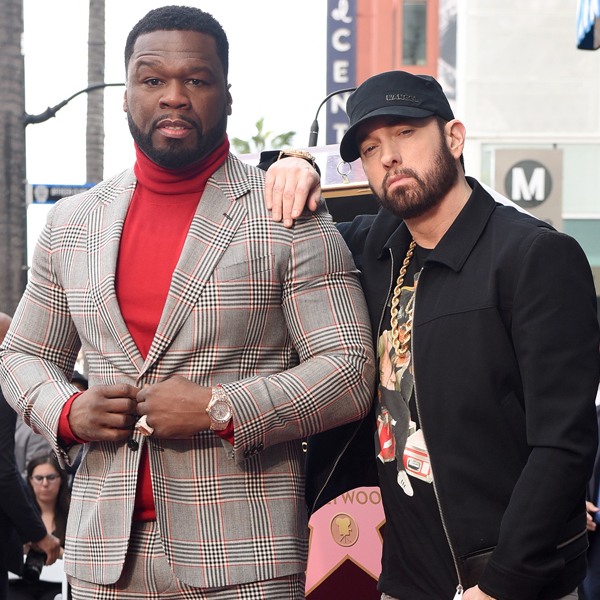 50 Cent getting his Star on the walk of fame while flanked by Dr Dre and  Eminem. Some white-hot kicks on…