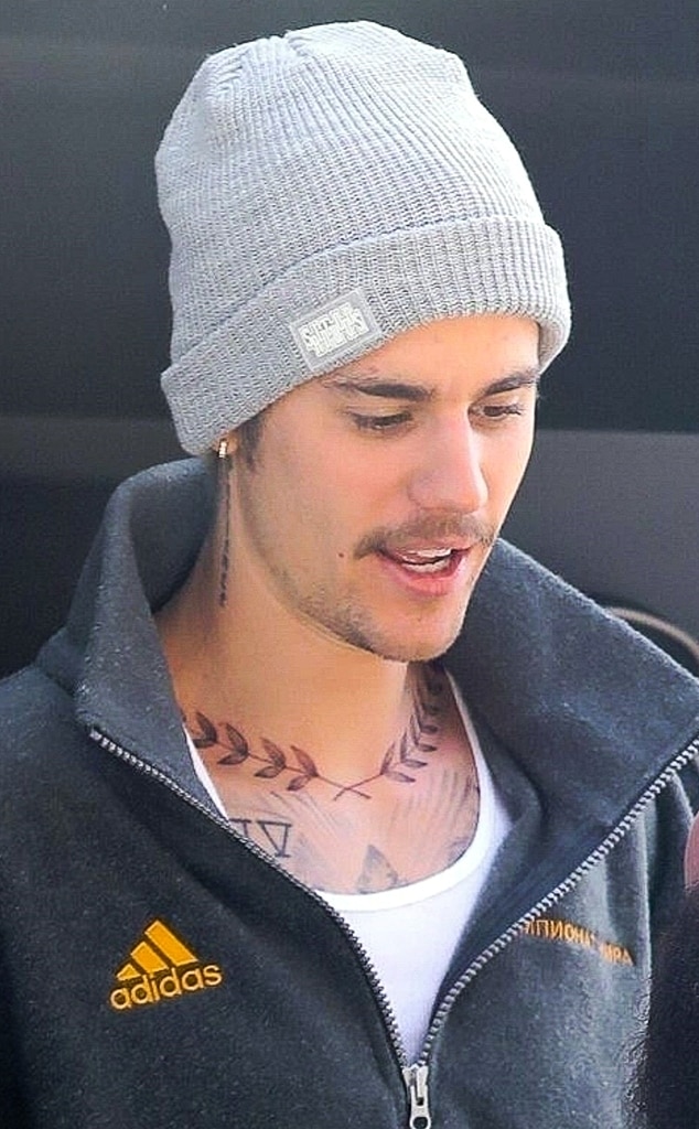Justins Roman Numeral Tattoo on His Chest  Shoulder PopStarTats