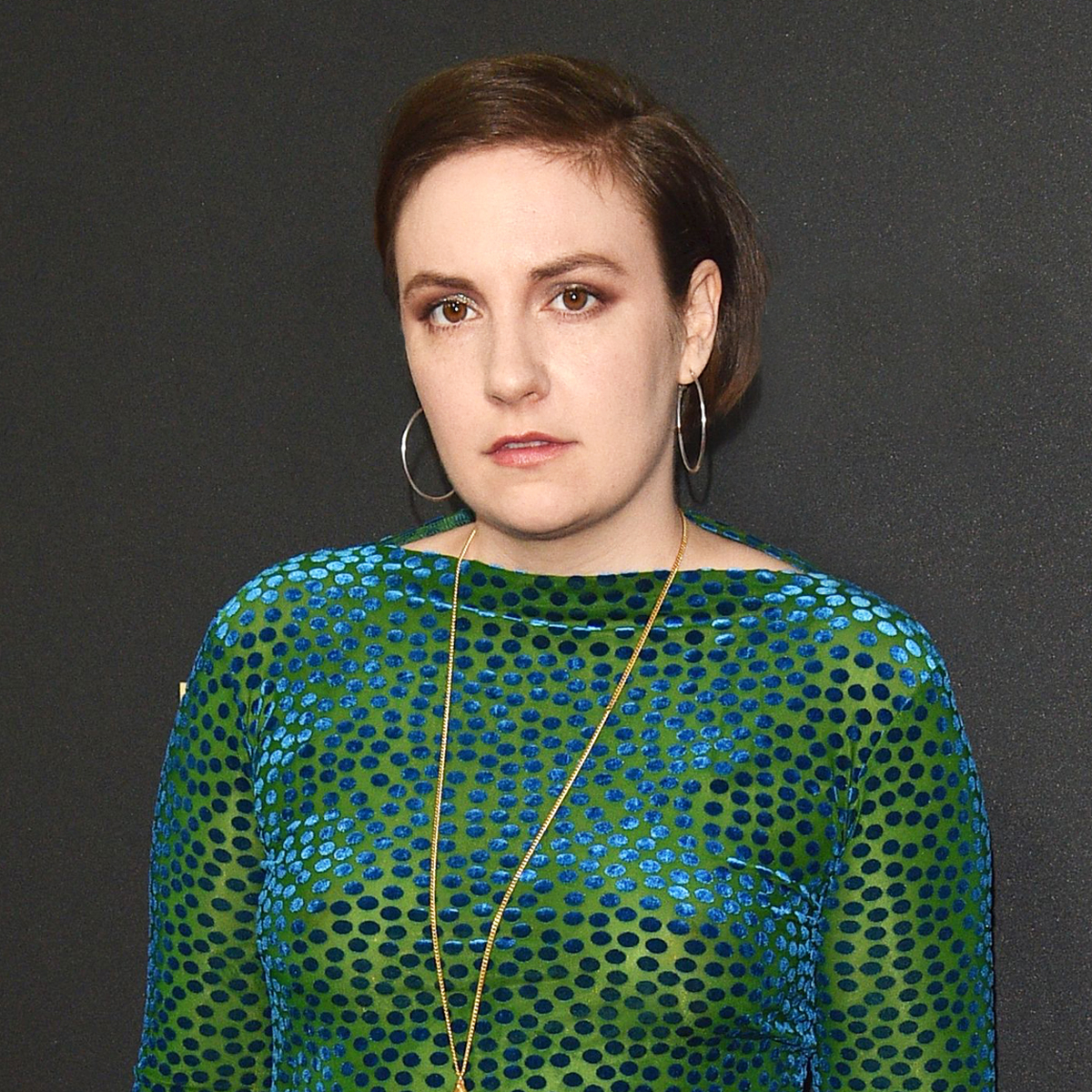 Lena Dunham Has a Message for Body Shamers Criticizing Her Appearance in Wedding Photos thumbnail