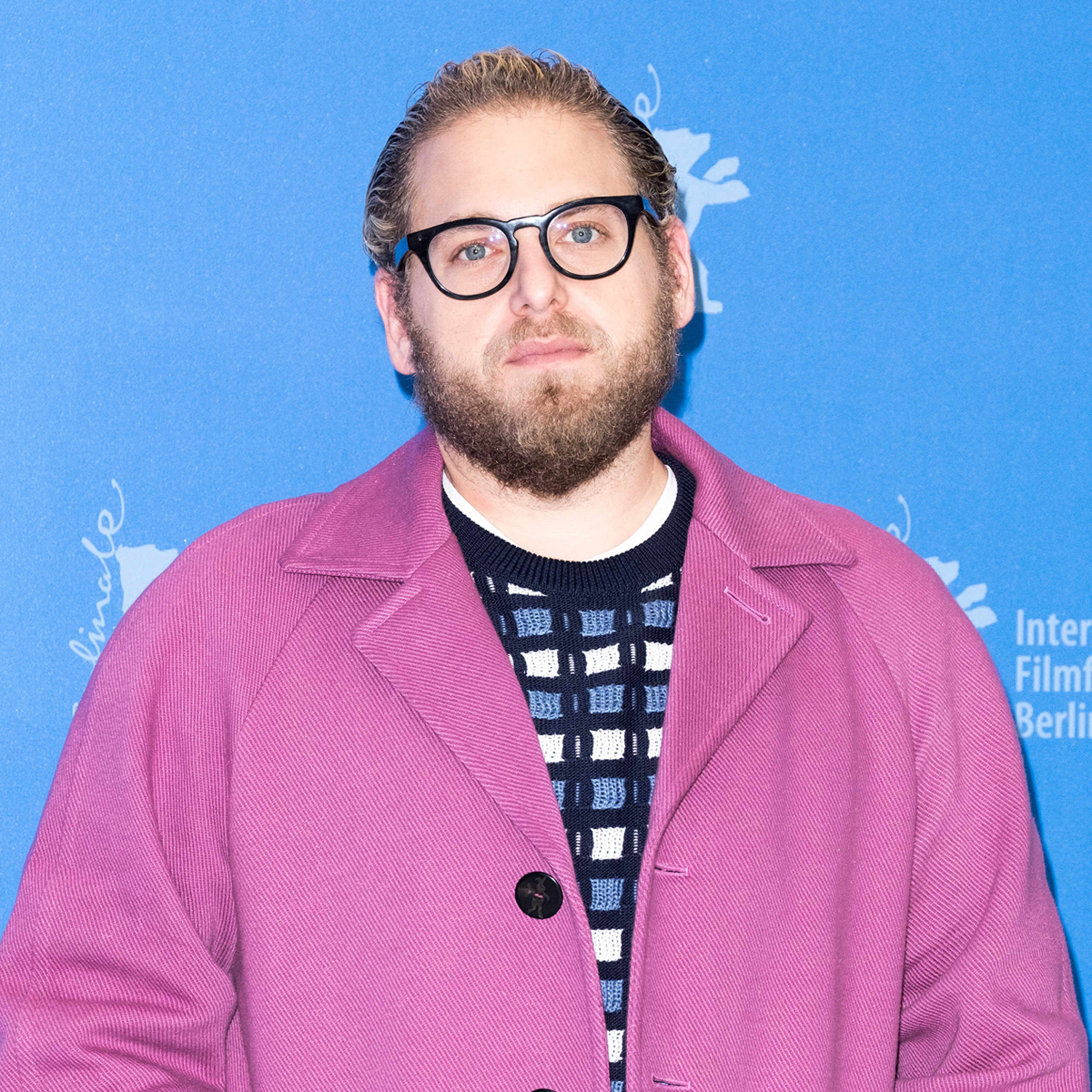 Jonah Hill shows off his guns in Phoenix Suns jersey tucked into trousers  while out in New York