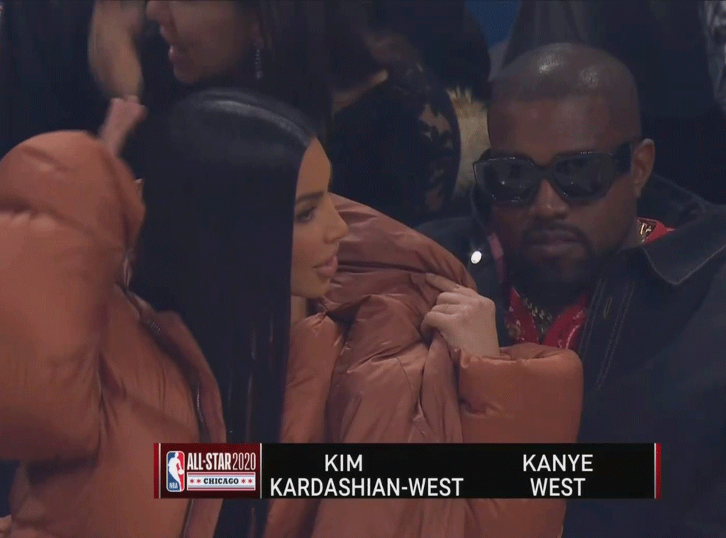 Kim Kardashian wears huge orange puffer jacket on date night with Kanye  West to star-studded NBA game – The US Sun