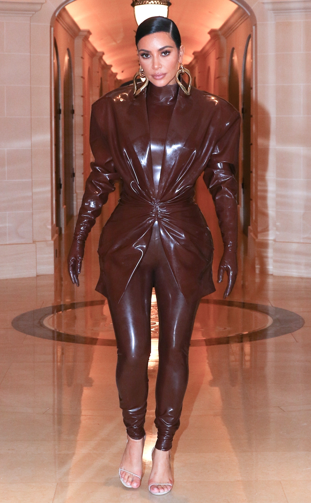 Watch Kim Kardashian squeeze into her latex suit during Paris