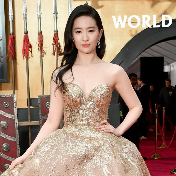 Mulan' Star Yifei Liu on Her Regal Gold Phoenix Gown at Hollywood Premiere  (Exclusive)