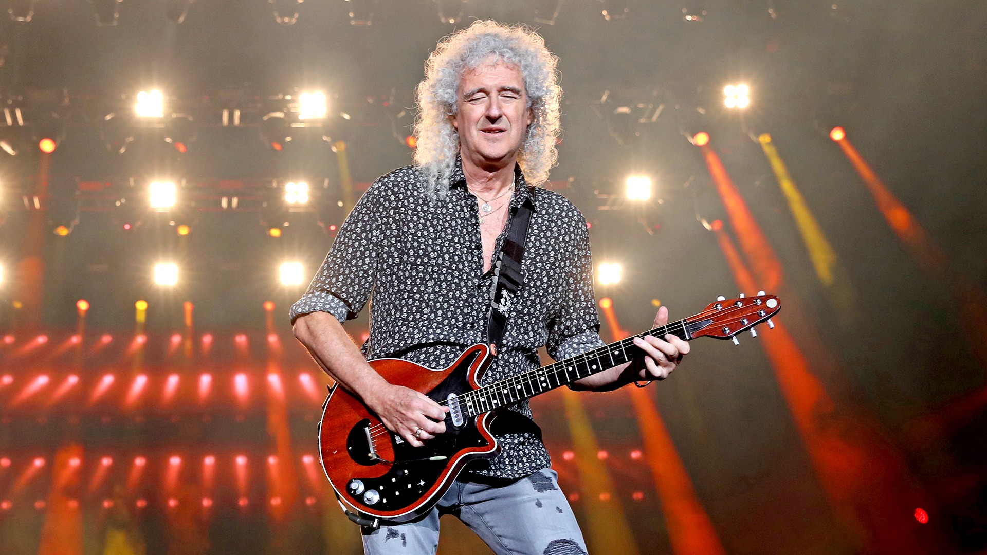 Queen’s Brian May Hospitalized After “Over-Enthusiastic Gardening” | E ...