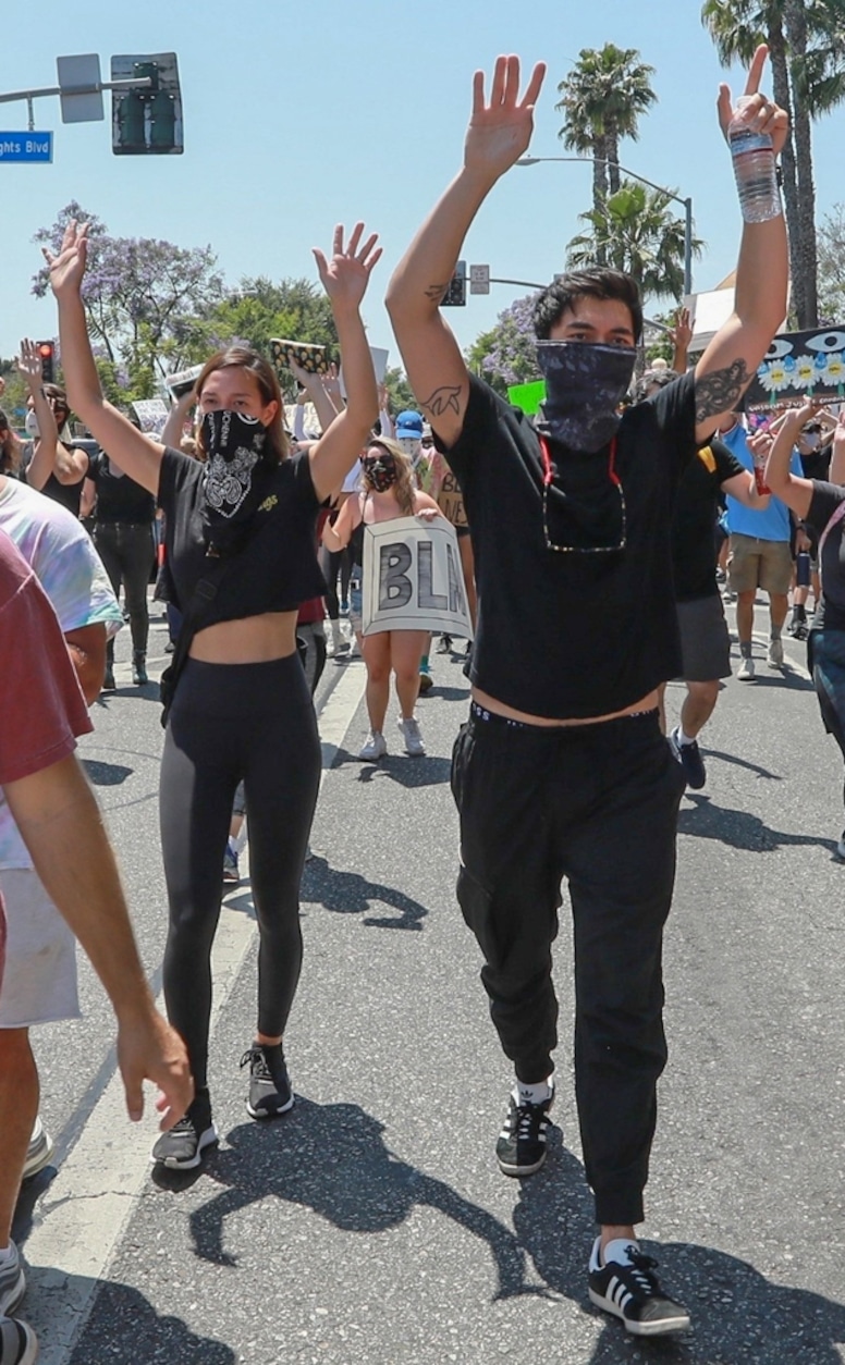 Henry Golding, Liv Lo, protest