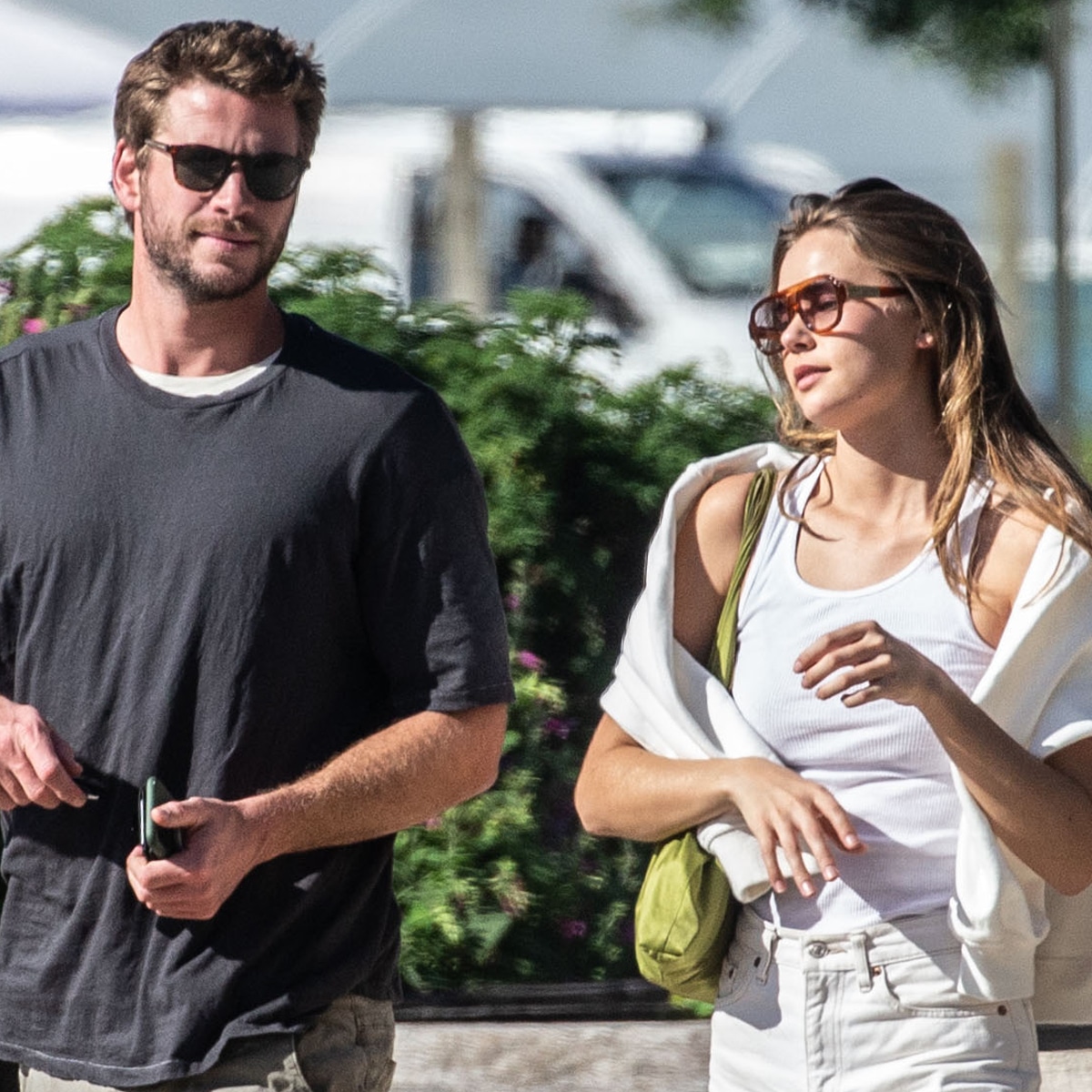 Gabriella Brooks And Liam Hemsworth Get Cozy In New Family Photo E Online