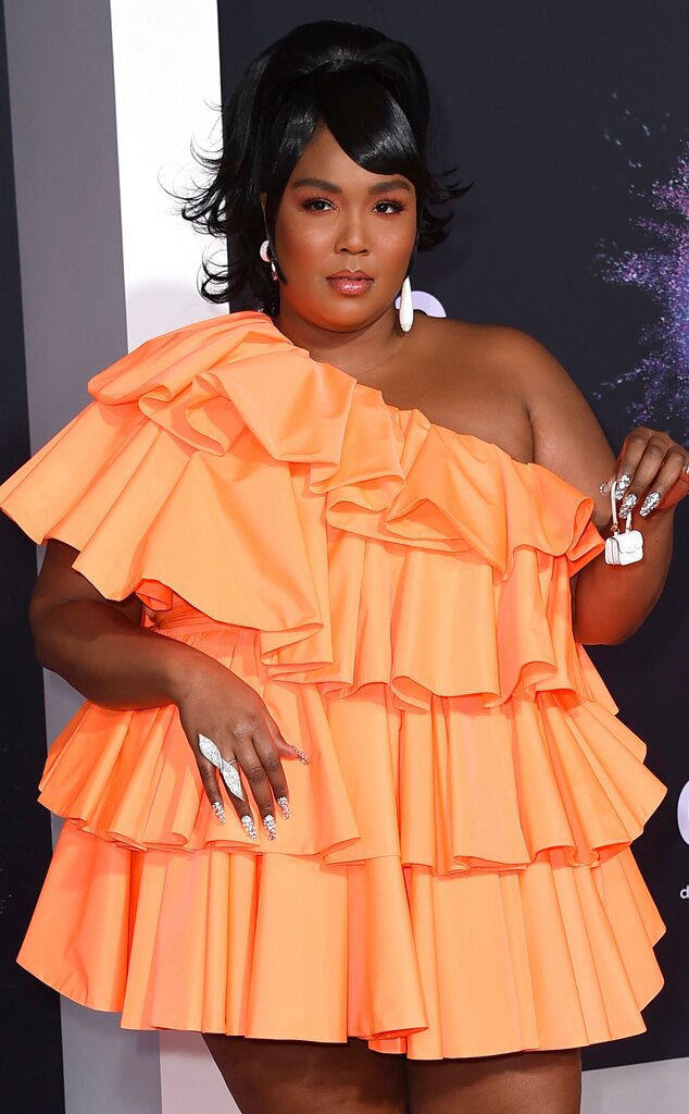 Guess what Lizzo keeps in her tiny purse?
