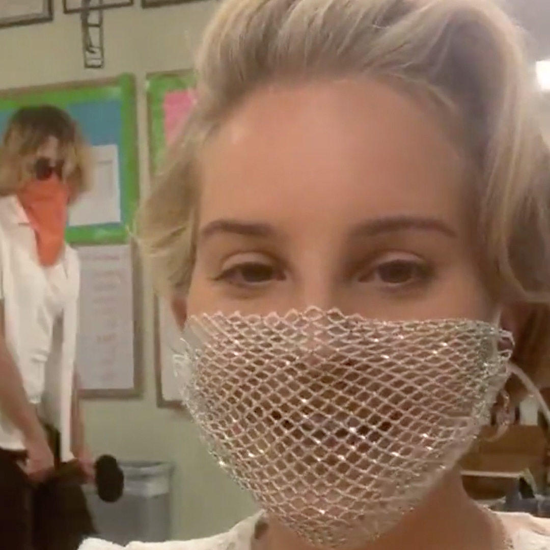 Lana del rey mask face mesh Lana Del Rey Receives Backlash After Wearing Mesh Face Mask - E! Online