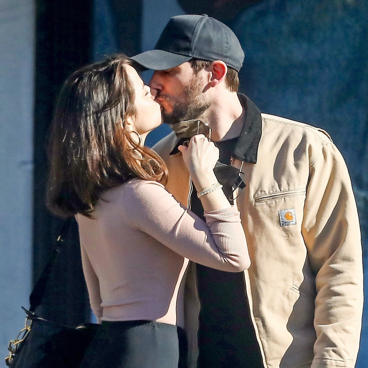 Ana de Armas kisses boyfriend Paul Boukadakis during LA stroll