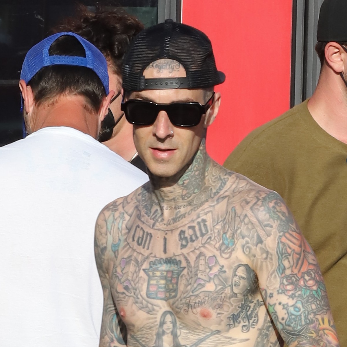 Travis Barker gets Kourtney Kardashians name tattooed on his chest  Metro  News