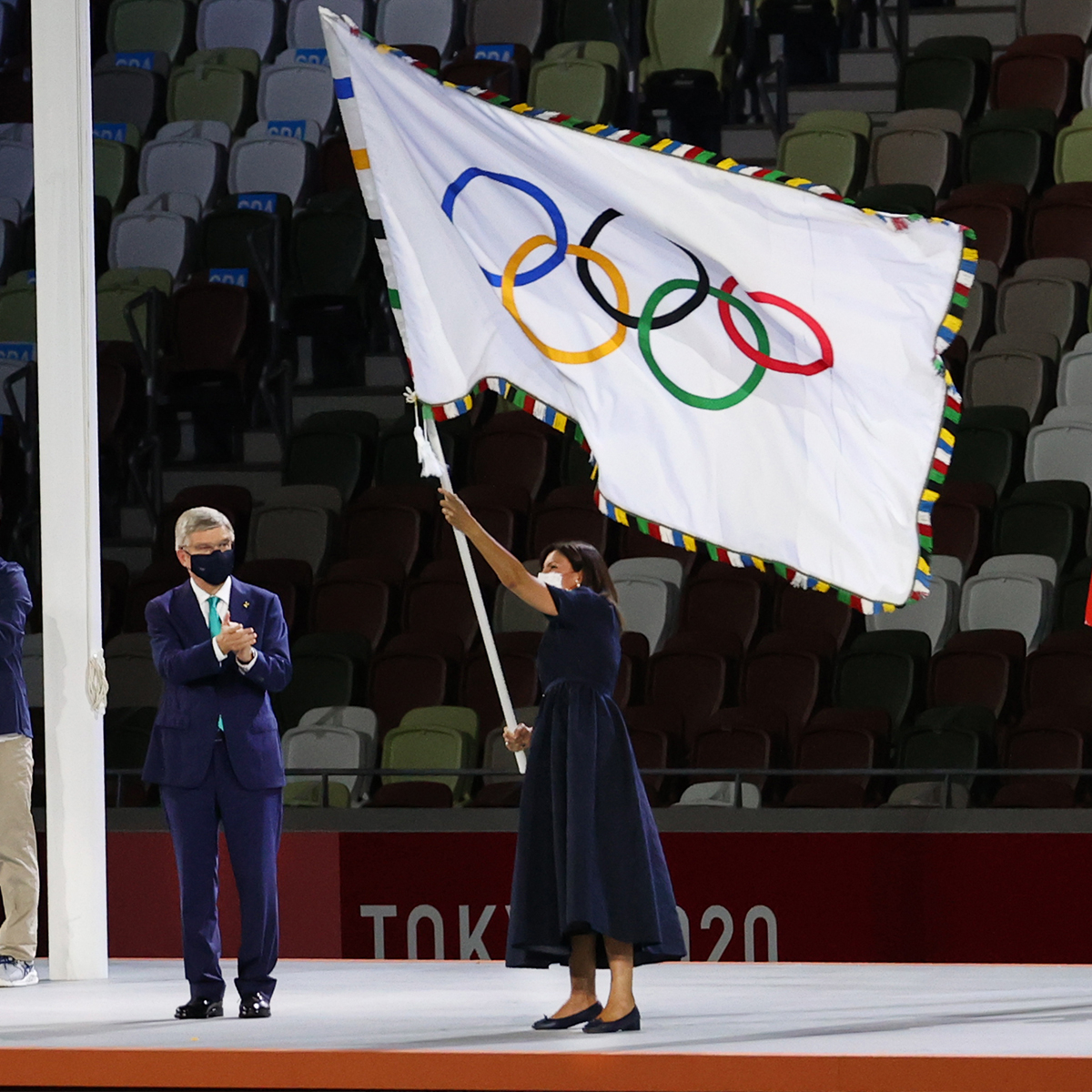 Collection 91+ Images what are the three flags at the olympic closing ceremony Updated