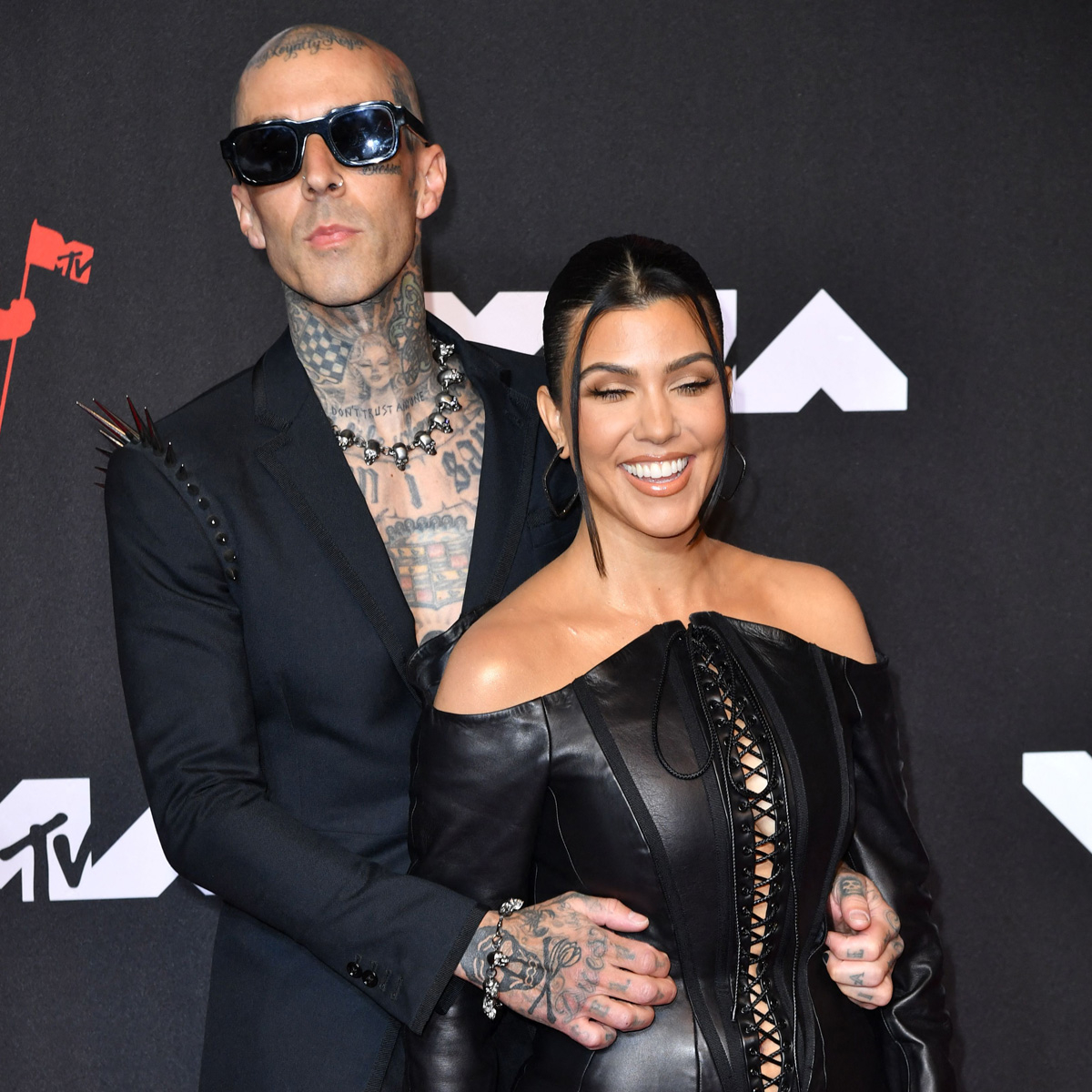 Kourtney Kardashian and Travis Barker Say They'd "Die" Each Other thumbnail