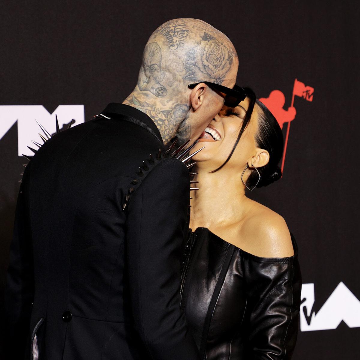 Kourtney Kardashian and Travis Barker Sizzle for Halloween With Their True Romance Costumes – E! Online