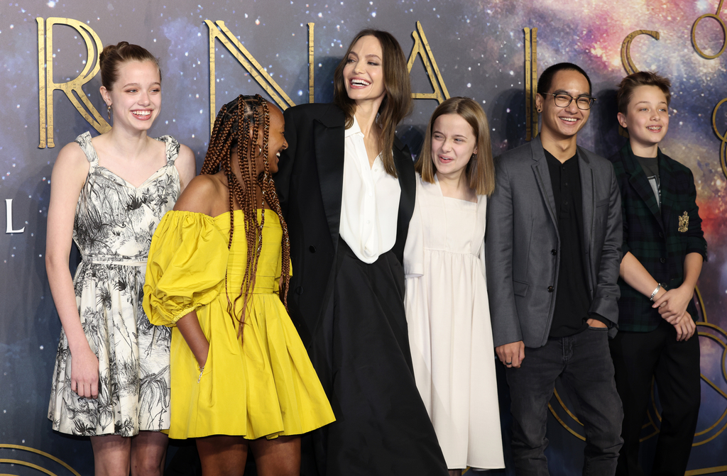 Angelina Jolie Attends LA Premiere of 'Eternals' With Her Kids, Wearing  Balmain Resort 2022 Brown Draped Corset and Pants Look + Zahara Jolie-Pitt  Rocks Mom's 2014 Oscars Dress by Elie Saab –