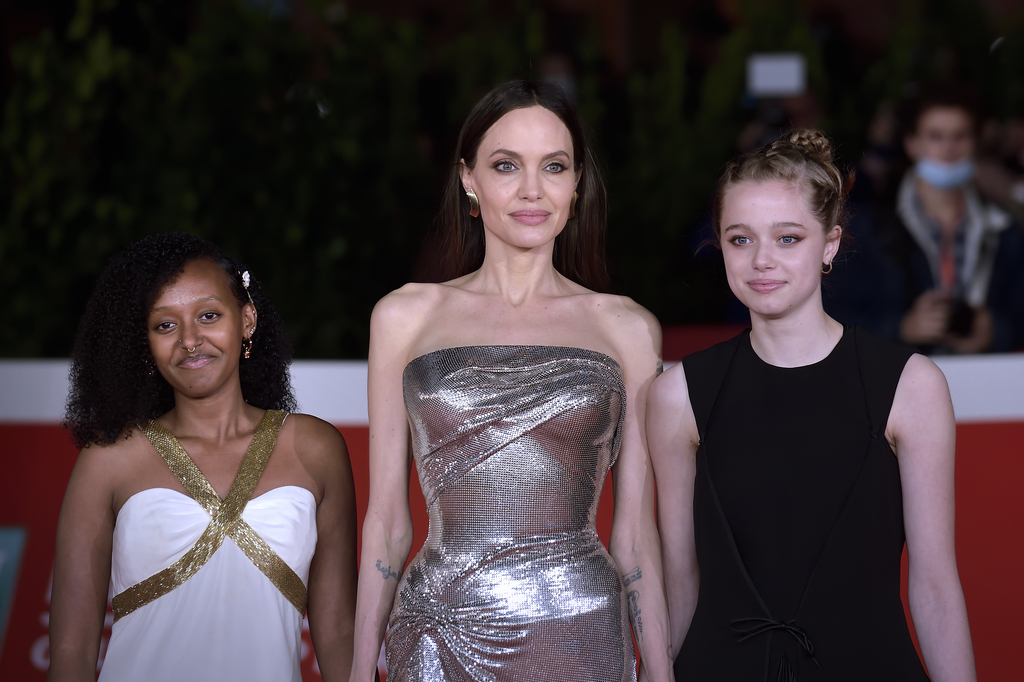 Angelina Jolie Attends LA Premiere of 'Eternals' With Her Kids, Wearing  Balmain Resort 2022 Brown Draped Corset and Pants Look + Zahara Jolie-Pitt  Rocks Mom's 2014 Oscars Dress by Elie Saab –