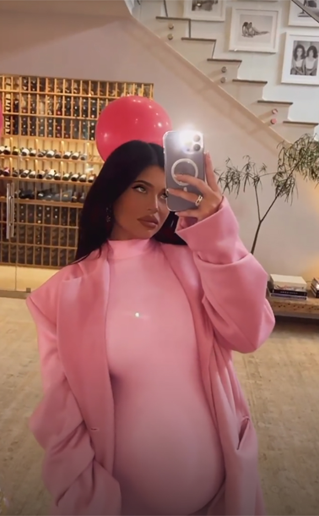 Kylie Jenner shows off her curves in a tight catsuit with her