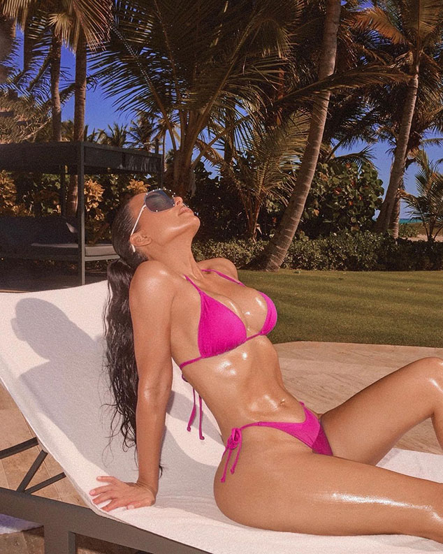 Kim Kardashian busts right out of tiny black triangle bikini top and  flaunts her massive pout in very sexy new selfies