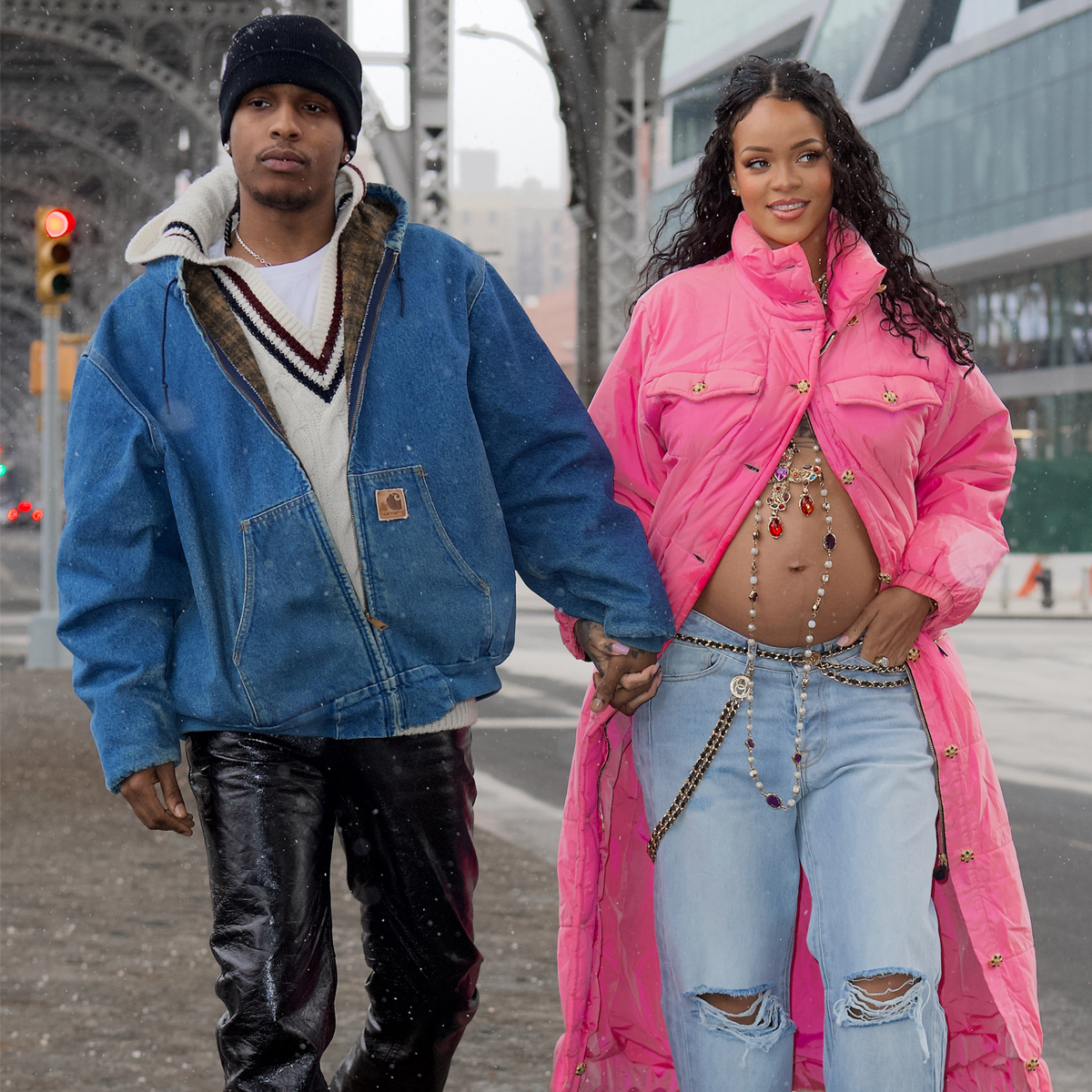 Rihanna Flexes Baby Bump at Pharrell's Louis Vuitton Debut Show – Footwear  News