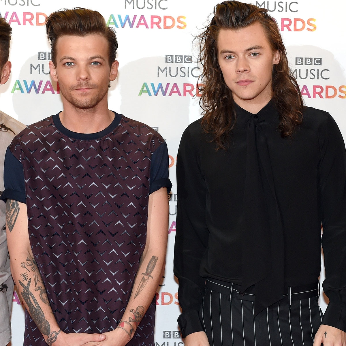 Why Louis Tomlinson Isn’t Worrying About Harry Styles Fan Theories