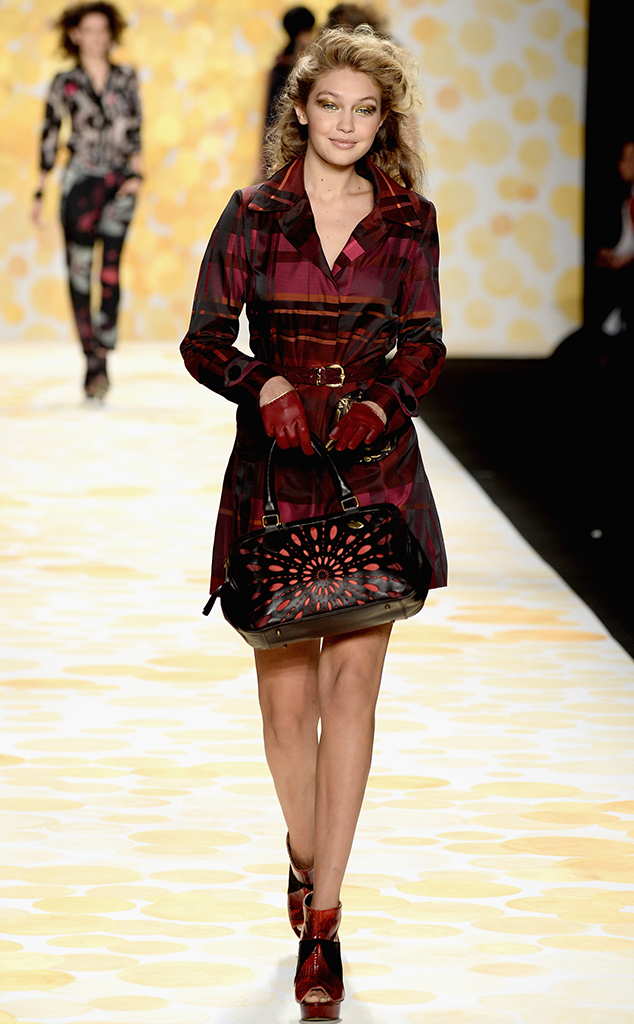 Gigi Hadid returns to the Versace catwalk in a crop top, six