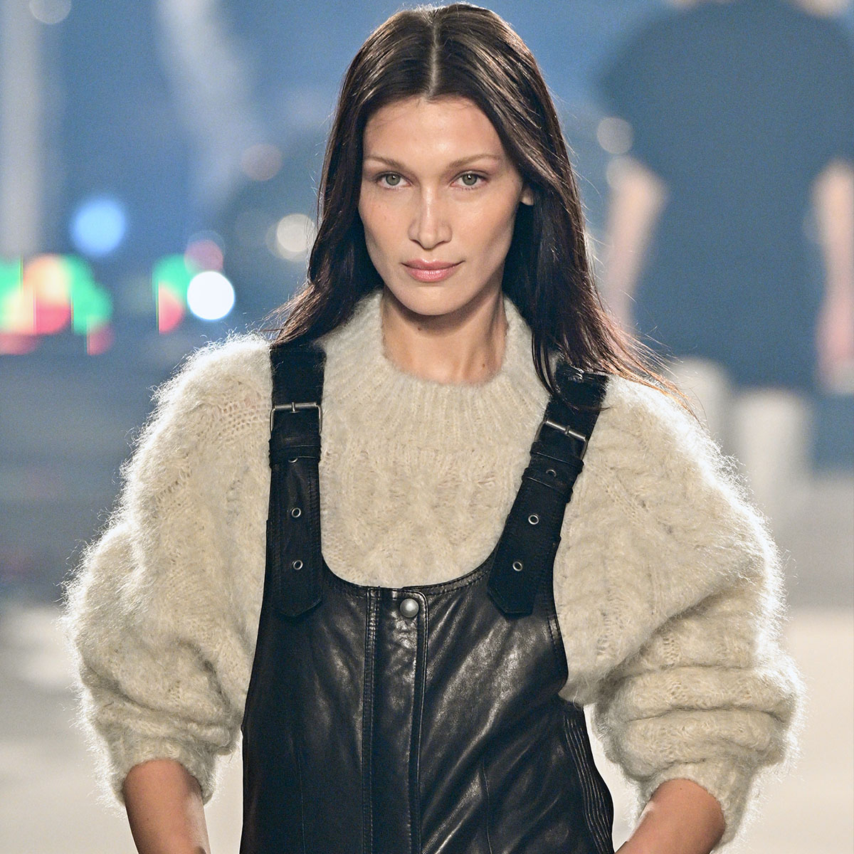 Bella Hadid wears a brown wool long coat, blue Vuitton bras, blue News  Photo - Getty Images