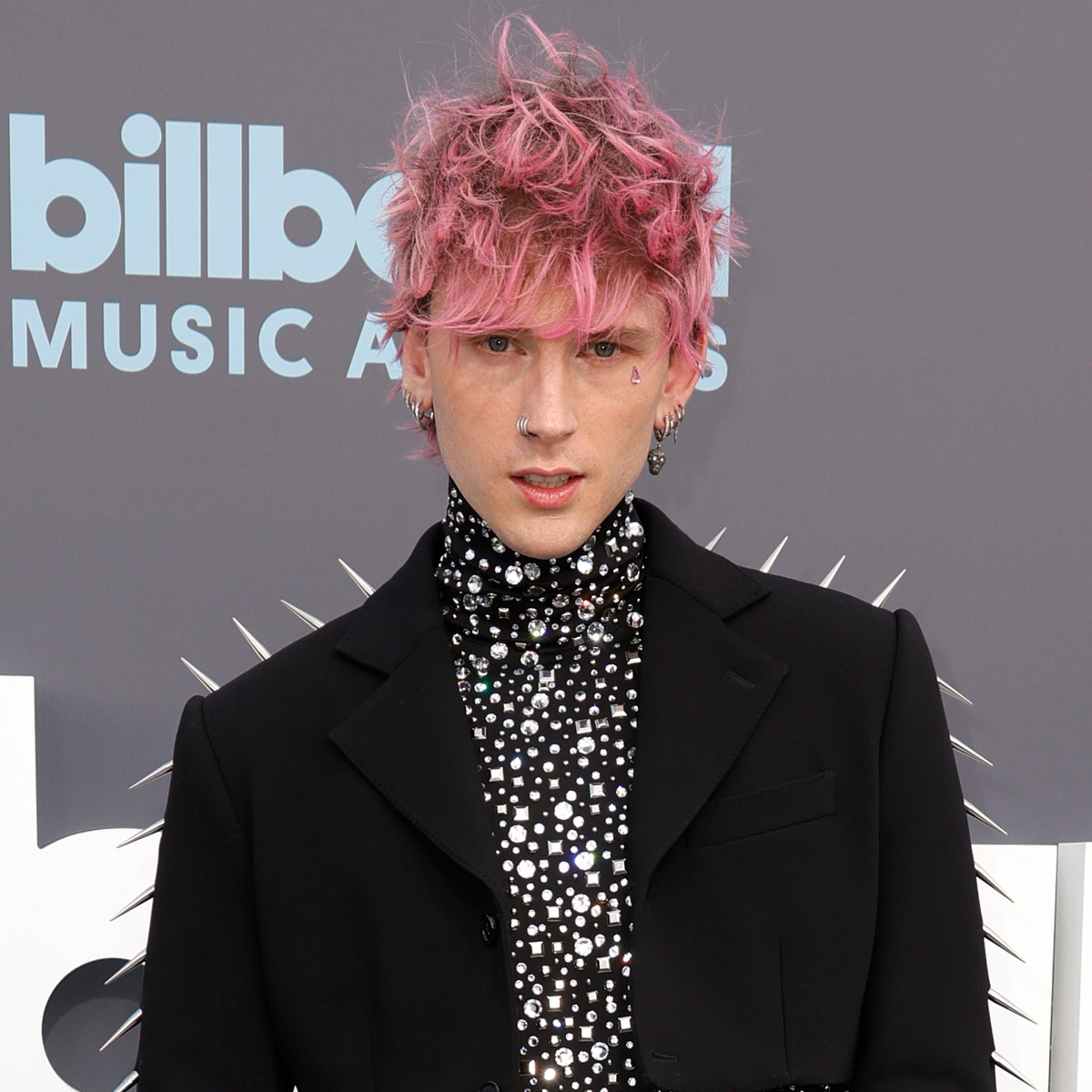 Machine Gun Kelly looks like quite the cool dad in punky attire