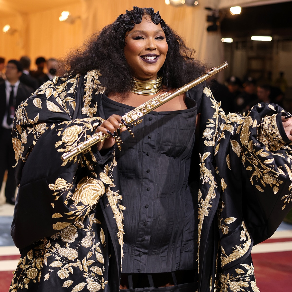 Great Outfits in Fashion History (Beauty Edition): Lizzo's Cheeto-Colored  Smoky Eyes - Fashionista