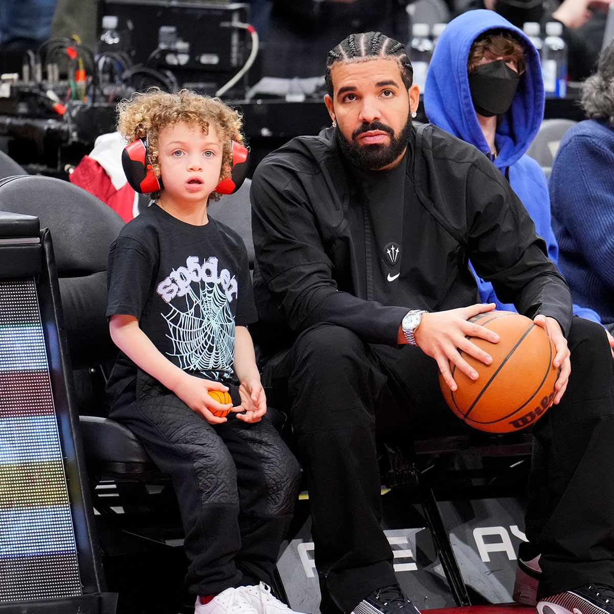 Drake and his son Adonis pose in matching outfits at mum's birthday party