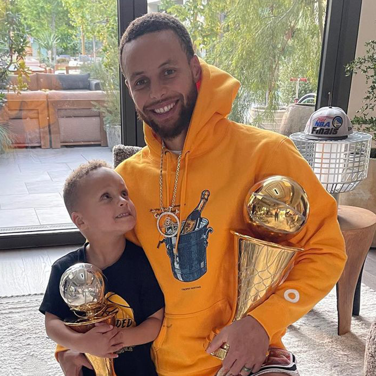 Stephen Curry's Son Cuddles Up to Dad as They Celebrate His NBA Finals