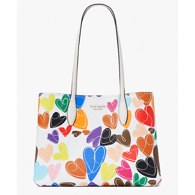 I bought this Kate Spade canvas tote on clearance. Loved it when I bought  it, first time I carried it I hated it and was going to resell, then I  started carrying
