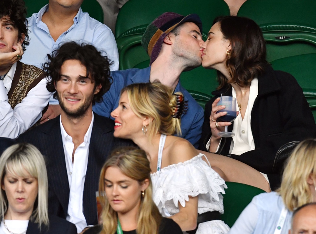 Tom Sturridge and Alexa Chung While Sitting With His Ex Sienna Miller at Wimbledon, he kissed her.