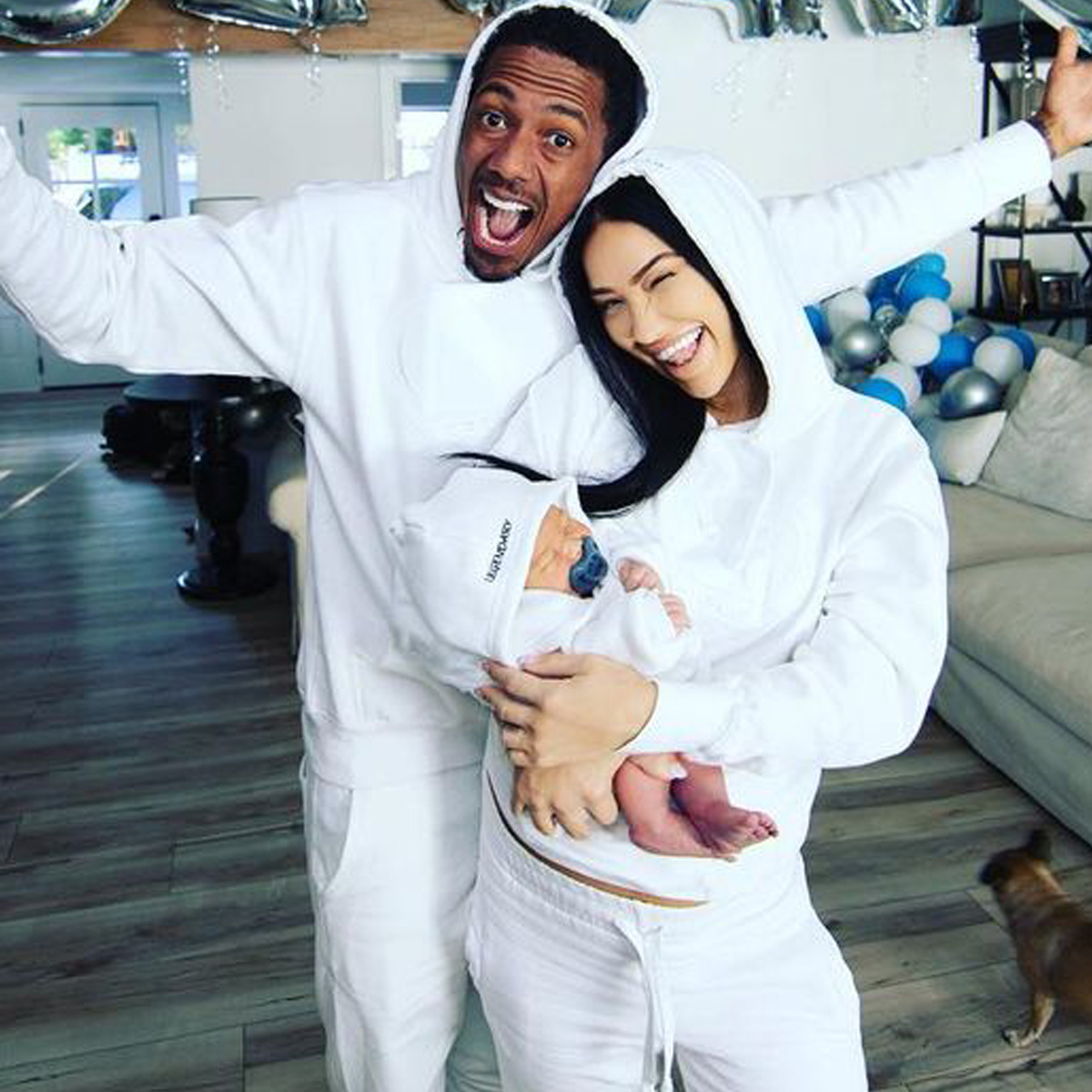 Nick Cannon Sleighs As Santa For Christmas With Bre Tiesi & Son