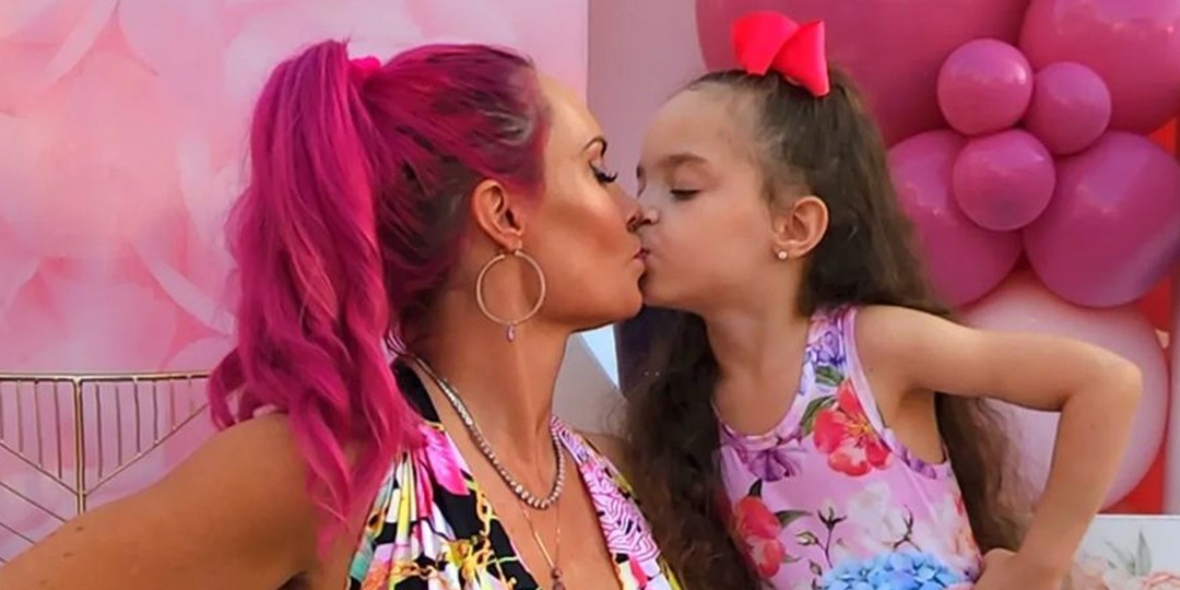 Coco Austin and Daughter Chanel Share a Kiss in Matching Floral Dresses at Friend’s Baby Shower - E! Online.jpg