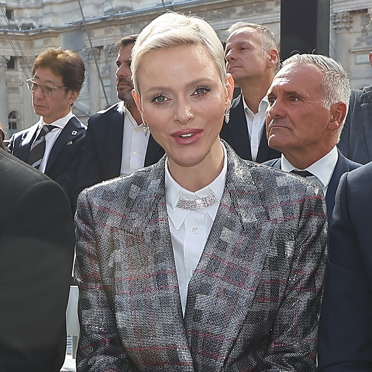 Monaco's Princess Charlene Makes Rare Appearance At Paris Fashion Show