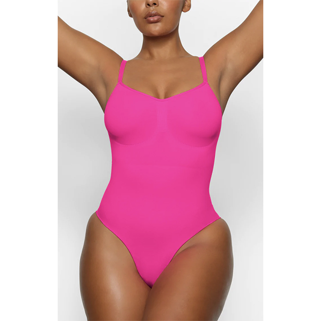Kim Kardashian's Skims pink zip up swimsuit