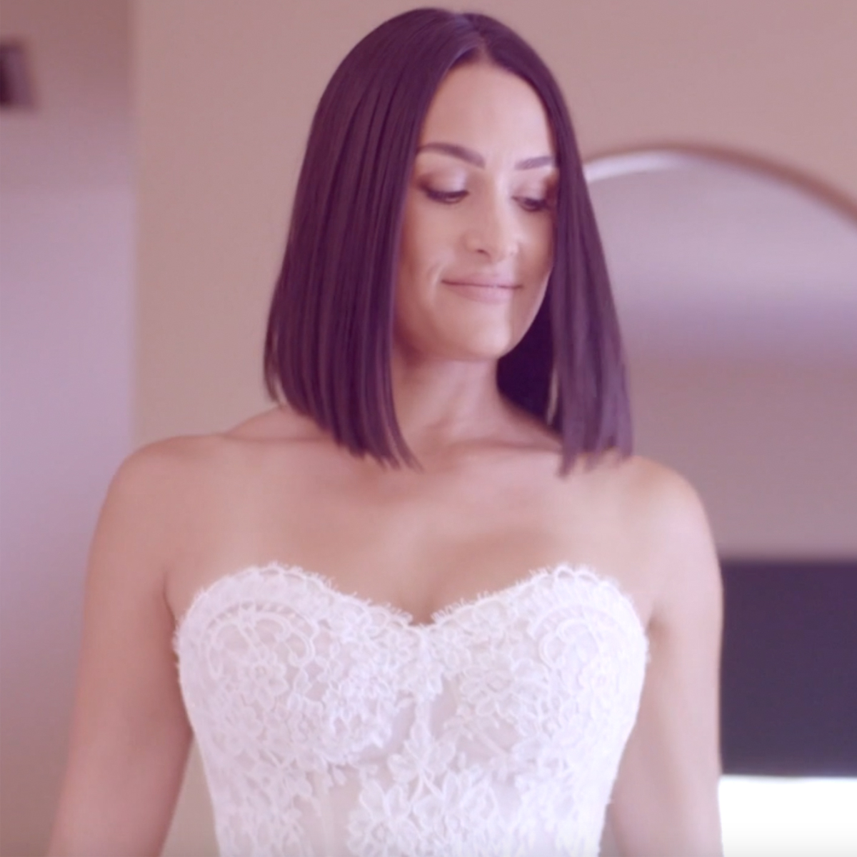 Nikki Bella wears white as she weds fiancé Artem Chigvintsev in