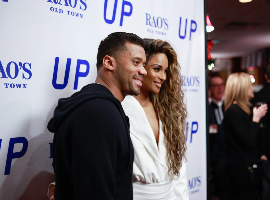 Ciara and husband Russell Wilson look loved-up at basketball match