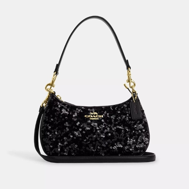 Coach Outlet s Holiday Gift Guide Has the Perfect Gifts for Everyone