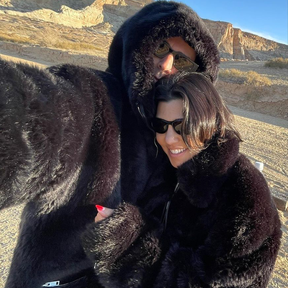 Kourtney Kardashian and Travis Barker Get Cozy on Snowy Valentine’s Day Trip – E! Online