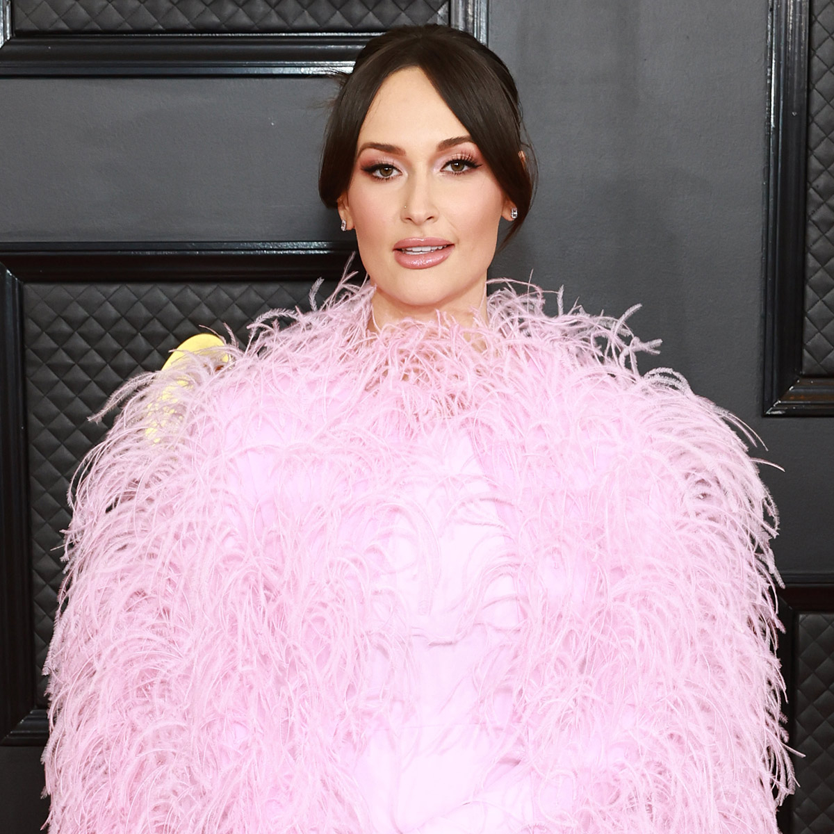 Kacey Musgraves rocks pink feathers on Grammys 2023 red carpet